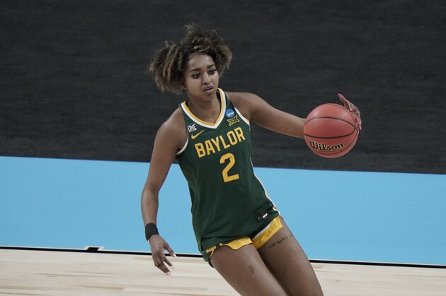 Baylor's DiDi Richards dribbles during the second half of an NCAA college basketball game against UConn in the Elite Eight round of the Women's NCAA tournament Monday, March 29, 2021, at the Alamodome in San Antonio. (AP Photo/Morry Gash)