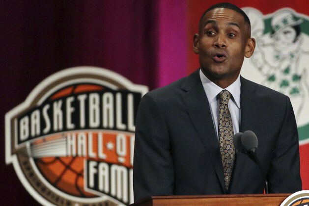 FILE - In this Sept. 7, 2018 file photo, Grant Hill speaks during induction ceremonies at the Basketball Hall of Fame in Springfield, Mass.  USA Basketball announced Saturday, April 3, 2021, that Hill will take over as managing director of the men’s national team after this summer’s Tokyo Olympics.  (AP Photo/Elise Amendola, File)