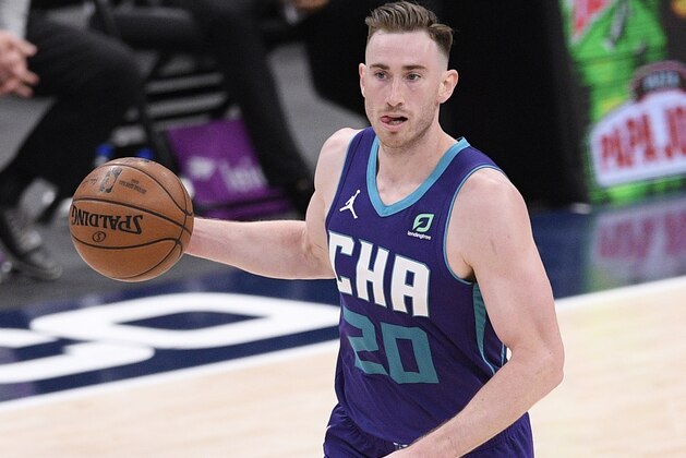 Charlotte Hornets forward Gordon Hayward (20) dribbles the ball during the second half of an NBA basketball game against the Washington Wizards, Tuesday, March 30, 2021, in Washington. (AP Photo/Nick Wass)