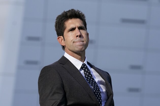 Golden State Warriors president of basketball operations and general manager Bob Myers listens to questions about injured player Klay Thompson, during a news conference in San Francisco, Thursday, Nov. 19, 2020. (AP Photo/Jeff Chiu)