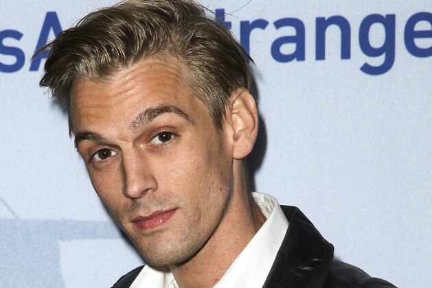 FILE - In this Nov. 9, 2015, file photo, singer Aaron Carter arrives at a premiere of