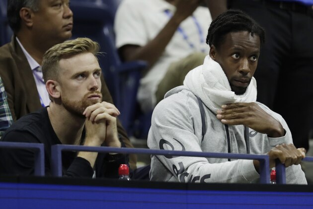 Gael Monfils, of France, watches play between Serena Williams, of the United States, and Elina Svitolina, of Ukraine, during the semifinals of the U.S. Open tennis championships Thursday, Sept. 5, 2019, in New York. (AP Photo/Adam Hunger)