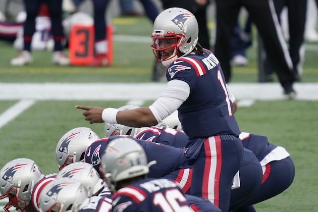 New England Patriots quarterback Cam Newton calls signals at the line of scrimmage in the first half of an NFL football game against the New York Jets, Sunday, Jan. 3, 2021, in Foxborough, Mass. (AP Photo/Charles Krupa)