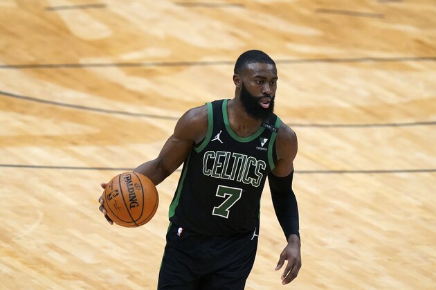 Boston Celtics guard Jaylen Brown (7) advances the ball up court in the second half of an NBA basketball game against the New Orleans Pelicans in New Orleans, Sunday, Feb. 21, 2021. (AP Photo/Gerald Herbert)