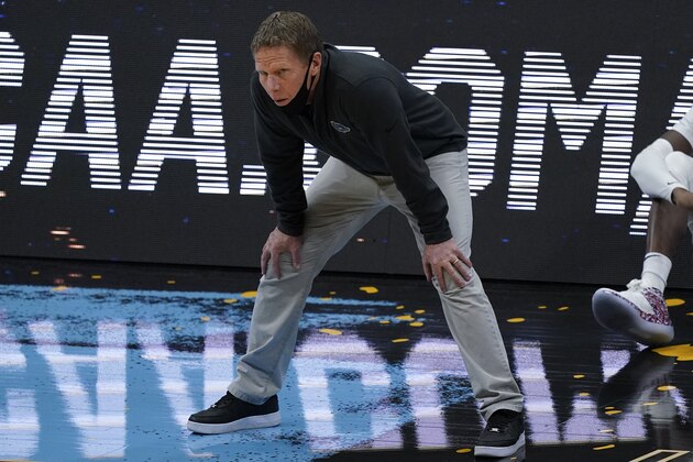 Gonzaga head coach Mark Few watches from the bench during the first half of a men's Final Four NCAA college basketball tournament semifinal game against UCLA, Saturday, April 3, 2021, at Lucas Oil Stadium in Indianapolis. (AP Photo/Darron Cummings)