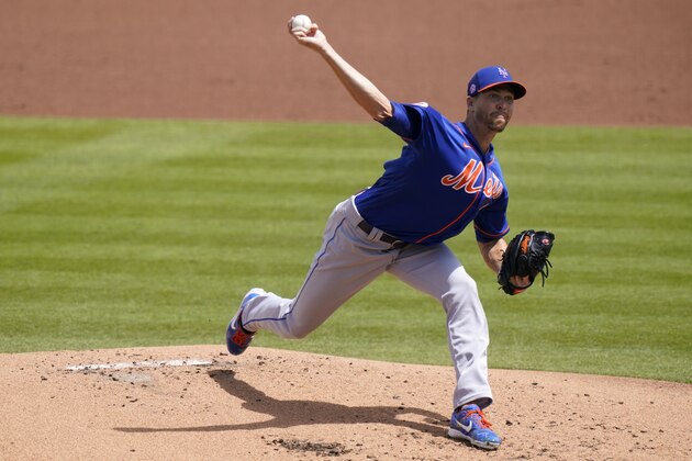 New York Mets starting pitcher Jacob deGrom throws during the first inning of a spring training baseball game against the Washington Nationals, Sunday, March 21, 2021, in West Palm Beach, Fla. (AP Photo/Lynne Sladky)