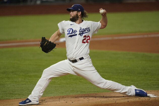 Los Angeles Dodgers starting pitcher Clayton Kershaw throws against the Tampa Bay Rays during the first inning in Game 1 of the baseball World Series Tuesday, Oct. 20, 2020, in Arlington, Texas. (AP Photo/Eric Gay)