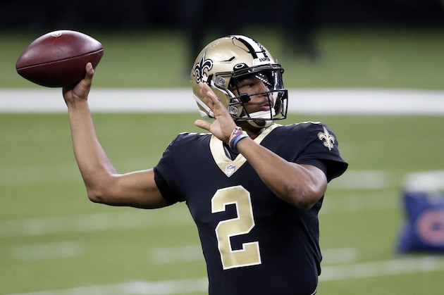 New Orleans Saints quarterback Jameis Winston (2) warms up before an NFL wild-card playoff football game against the Chicago Bears in New Orleans, Sunday, Jan. 10, 2021. (AP Photo/Butch Dill)