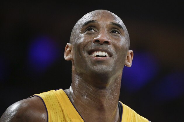 FILE - In this April 13, 2016, file photo, Los Angeles Lakers forward Kobe Bryant smiles during the first half of his last NBA basketball game, against the Utah Jazz in Los Angeles. The Naismith Memorial Basketball Hall of Fame was gearing up for a great year: not just the certain election of NBA superstars like Kobe Bryant, Kevin Garnett and Tim Duncan, but also a chance to unveil a completely renovated museum. Because of the coronavirus outbreak, the reopening has been pushed back two months to July 1 and the induction ceremony is being postponed, either to October or the spring. (AP Photo/Jae C. Hong, File)