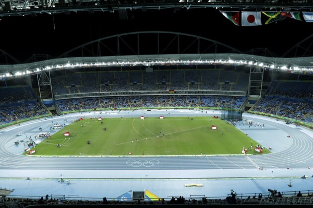 Empty seats inside the Olympic stadium during the athletics competitions of the 2016 Summer Olympics at the Olympic stadium in Rio de Janeiro, Brazil, Friday, Aug. 12, 2016. (AP Photo/Gregory Bull)