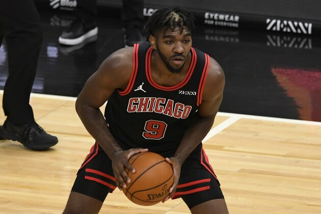 Chicago Bulls' Patrick Williams looks to pass during the second half of an NBA basketball game against the Dallas Mavericks Sunday, Jan. 3, 2021, in Chicago. Chicago won 118-108. (AP Photo/Paul Beaty)