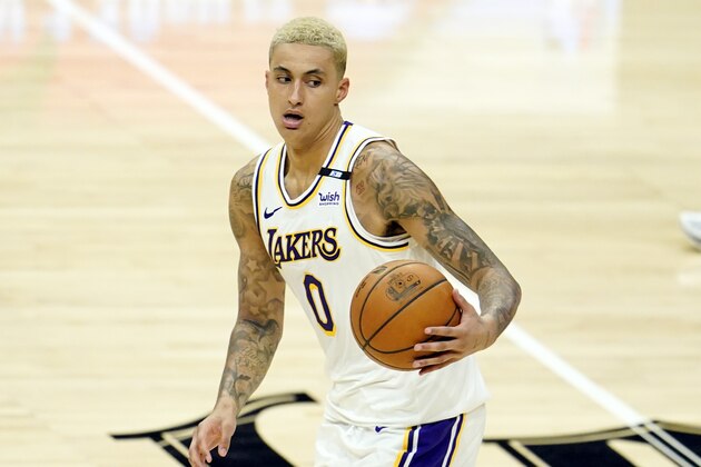 Los Angeles Lakers forward Kyle Kuzma dribbles during an NBA basketball game against the Los Angeles Clippers Sunday, April 4, 2021, in Los Angeles. (AP Photo/Marcio Jose Sanchez)