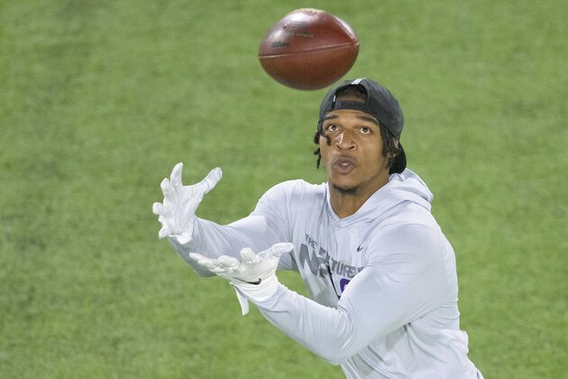 LSU wide receiver Ja'Marr Chase catches during a drill at an NFL Pro Day at LSU in Baton Rouge, La., Wednesday, March 31, 2021. (AP Photo/Matthew Hinton)