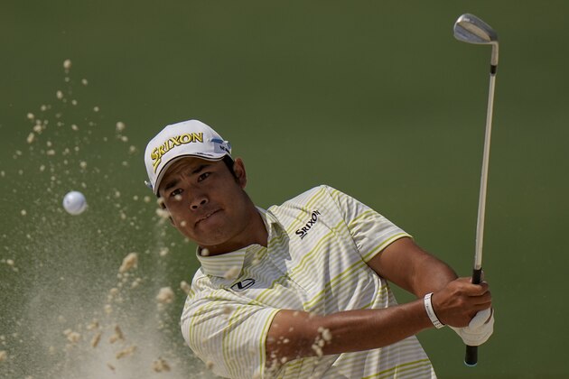 Hideki Matsuyama, of Japan, watches his ball out of a bunker on the second hole during the final round of the Masters golf tournament on Sunday, April 11, 2021, in Augusta, Ga. (AP Photo/Matt Slocum)