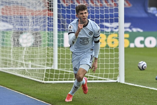 Chelsea's Christian Pulisic celebrates after scoring his side's second goal during the English Premier League soccer match between Crystal Palace and Chelsea at Selhurst Park stadium in London, Saturday, April 10, 2021. (Justin Tallis/Pool via AP)