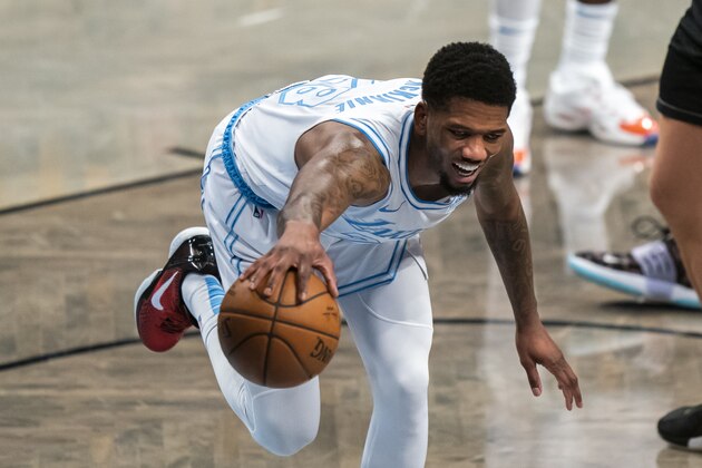 Los Angeles Lakers forward Alfonzo McKinnie (28) reaches for a loose ball in the second half of an NBA basketball game against the Brooklyn Nets, Saturday, April 10, 2021, in New York. (AP Photo/Corey Sipkin)