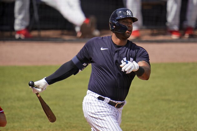 New York Yankees' Aaron Hicks bats during a spring training exhibition baseball game against the Philadelphia Phillies in Tampa, Fla., Monday, March 15, 2021. (AP Photo/Gene J. Puskar)