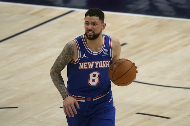 New York Knicks guard Austin Rivers (8) brings the ball up court in the second half during an NBA basketball game against the Utah Jazz Tuesday, Jan. 26, 2021, in Salt Lake City. (AP Photo/Rick Bowmer)