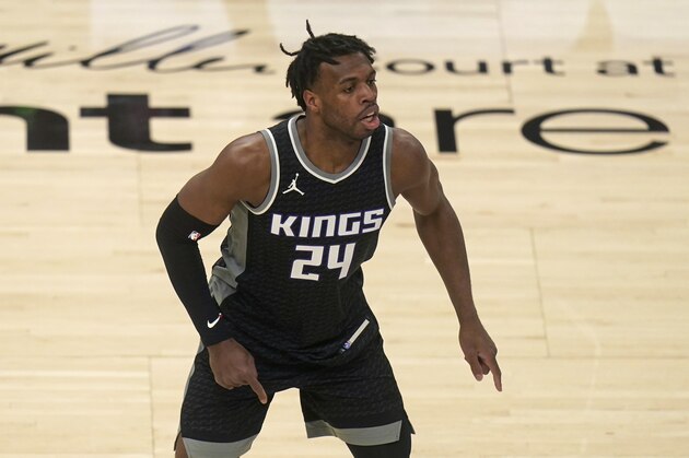 Sacramento Kings guard Buddy Hield (24) plays defense in the first half during an NBA basketball game against the Utah Jazz Saturday, April 10, 2021, in Salt Lake City. (AP Photo/Rick Bowmer)