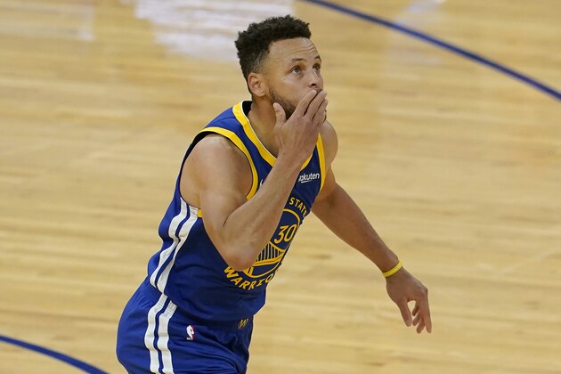 Golden State Warriors guard Stephen Curry (30) gestures after scoring against the Denver Nuggets to pass Wilt Chamberlain to become the franchise's all-time leading scorer during the first half of an NBA basketball game in San Francisco, Monday, April 12, 2021. (AP Photo/Jeff Chiu)