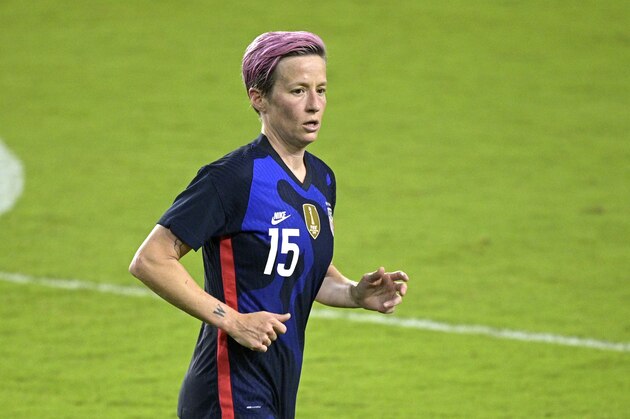 United States forward Megan Rapinoe (15) follows a play during the second half of a SheBelieves Cup women's soccer match against Argentina, Wednesday, Feb. 24, 2021, in Orlando, Fla. (AP Photo/Phelan M. Ebenhack)