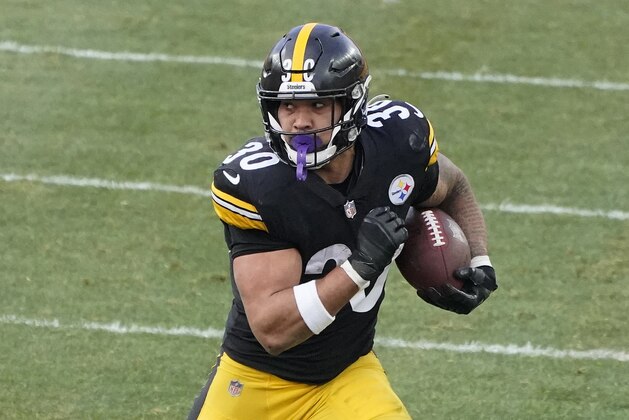 Pittsburgh Steelers running back James Conner (30) carries the ball during the second half of an NFL football game, Sunday, Dec. 27, 2020, in Pittsburgh. (AP Photo/Gene J. Puskar)