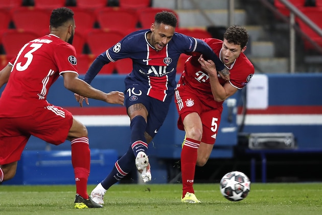 Bayern's Eric Maxim Choupo-Moting, left, Bayern's Benjamin Pavard, right, and PSG's Neymar challenge for the ball during the Champions League, second leg, quarterfinal soccer match between Paris Saint Germain and Bayern Munich at the Parc des Princes stadium, in Paris, France, Tuesday, April 13, 2021. (AP Photo/Francois Mori)