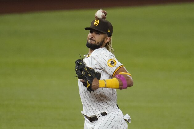 San Diego Padres shortstop Fernando Tatis Jr. throws in Game 3 of a baseball National League Division Series against the Los Angeles Dodgers Thursday, Oct. 8, 2020, in Arlington, Texas. (AP Photo/Sue Ogrocki)