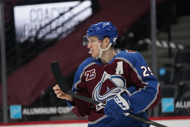 Colorado Avalanche center Nathan MacKinnon (29) in the first period of an NHL hockey game Monday, April 12, 2021, in Denver. (AP Photo/David Zalubowski)