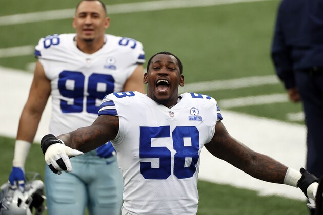 Dallas Cowboys defensive end Aldon Smith (58) reacts on the bench before an NFL football game against the New York Giants, Sunday, Jan. 3, 2021, in East Rutherford, N.J. (AP Photo/Adam Hunger)