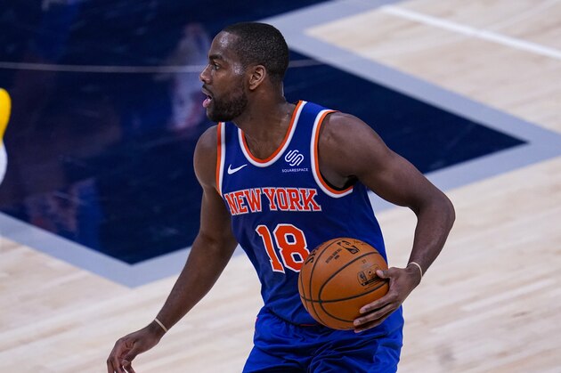 New York Knicks guard Alec Burks (18) plays against the Indiana Pacers during the second half of an NBA basketball game in Indianapolis, Wednesday, Dec. 23, 2020. (AP Photo/Michael Conroy)