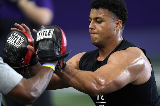Northwestern offensive lineman Rashawn Slater, participates in the school's Pro Day football workout for NFL scouts Tuesday, March 9, 2021, in Evanston, Ill. (AP Photo/Charles Rex Arbogast)