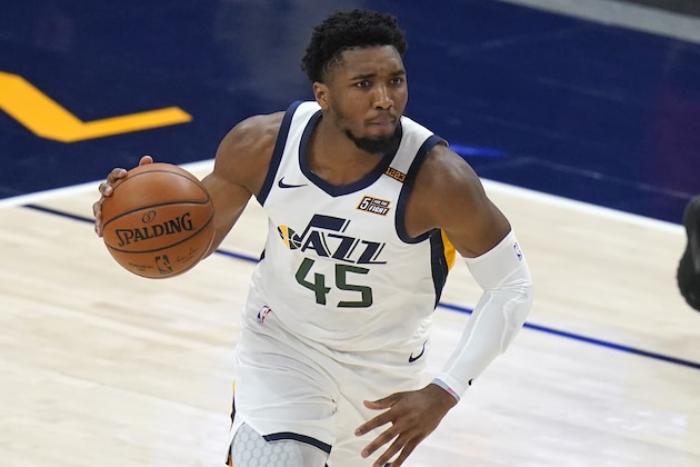 Utah Jazz guard Donovan Mitchell (45) brings the ball up diromg the first half of the team's NBA basketball game against the Indiana Pacers on Friday, April 16, 2021, in Salt Lake City. (AP Photo/Rick Bowmer)