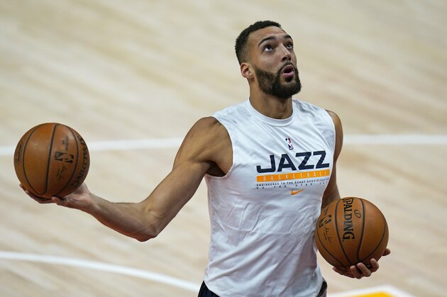 Utah Jazz center Rudy Gobert warms up before their NBA basketball game against the Philadelphia 76ers Monday, Feb. 15, 2021, in Salt Lake City. (AP Photo/Rick Bowmer)