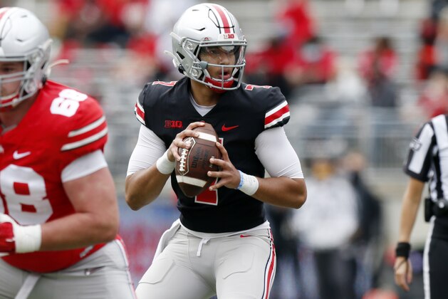Ohio State quarterback C.J. Stroud drops back to pass during the Buckeyes' spring NCAA college football game in Columbus, Ohio, Saturday, April 17, 2021. (AP Photo/Paul Vernon)