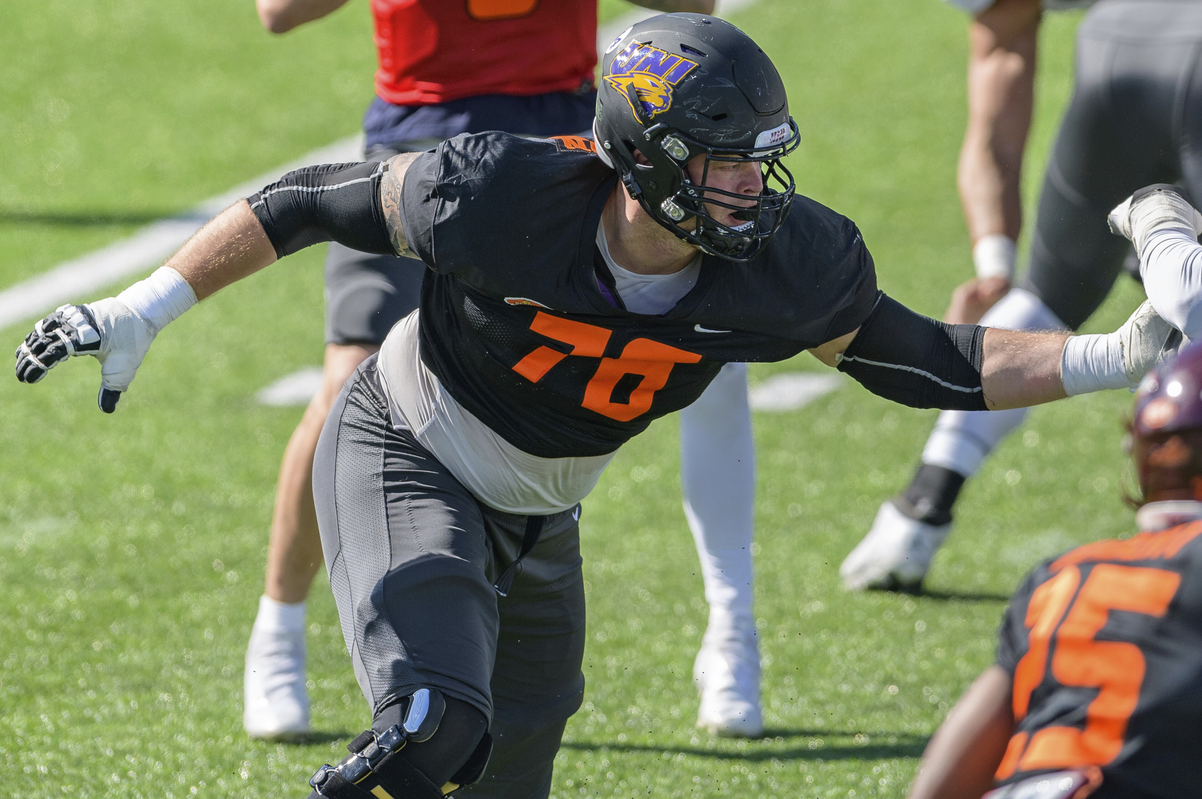 National Team offensive lineman Spencer Brown of Northern Iowa (FCS) (76) blocks during the National Team practice for the Senior Bowl college football game in Mobile, Ala., Thursday, Jan. 28, 2021. (AP Photo/Matthew Hinton) National Team offensive lineman Spencer Brown of Northern Iowa (FCS) (76) blocks during the National Team practice for the Senior Bowl college football game in Mobile, Ala., Thursday, Jan. 28, 2021. (AP Photo/Matthew Hinton)