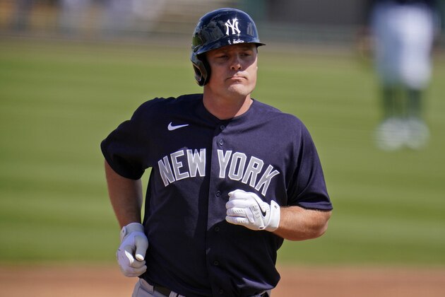 New York Yankees' Jay Bruce rounds second after hitting a two-run home run off Detroit Tigers pitcher Spencer Turnbull during the second inning of a spring training exhibition baseball game at Joker Marchant Stadium in Lakeland, Fla., Tuesday, March 9, 2021. (AP Photo/Gene J. Puskar