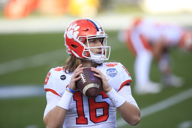 Clemson quarterback Trevor Lawrence (16) warms up before the start of the Atlantic Coast Conference championship NCAA college football game against Notre Dame, Saturday, Dec. 19, 2020, in Charlotte, N.C. (AP Photo/Brian Blanco)