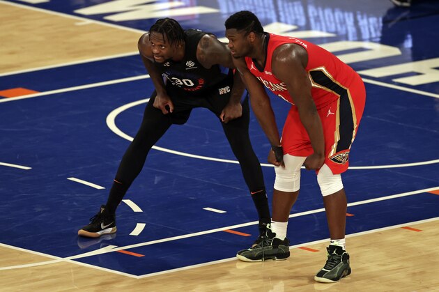 New York Knicks forward Julius Randle (30) and New Orleans Pelicans forward Zion Williamson (1) during a break in game action during the second half of an NBA basketball game Sunday, April 18, 2021, in New York. The Knicks won in overtime 122-112. (AP Photo/Adam Hunger, Pool)