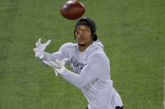 LSU wide receiver Ja'Marr Chase makes a reception during an NFL Pro Day at LSU in Baton Rouge, La., Wednesday, March 31, 2021. (AP Photo/Matthew Hinton)