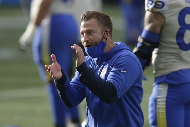 Los Angeles Rams head coach Sean McVay greets players before an NFL wild-card playoff football game against the Seattle Seahawks, Saturday, Jan. 9, 2021, in Seattle. (AP Photo/Scott Eklund)