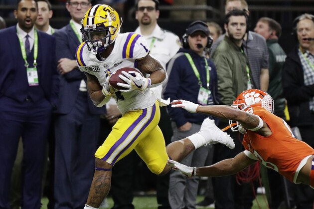 FILE - In this Jan. 13, 2020, file photo, LSU wide receiver Ja'Marr Chase scores past Clemson cornerback A.J. Terrell during the first half of a NCAA College Football Playoff national championship game, in New Orleans. Chase was selected to The Associated Press preseason All-America first-team, Tuesday, Aug. 25, 2020. (AP Photo/Sue Ogrocki, File)