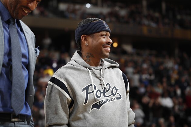 Retired Denver Nuggets guard Allen Iverson in the second half of an NBA basketball game Friday, Feb. 23, 2018, in Denver. The Nuggets won 122-119. (AP Photo/David Zalubowski)