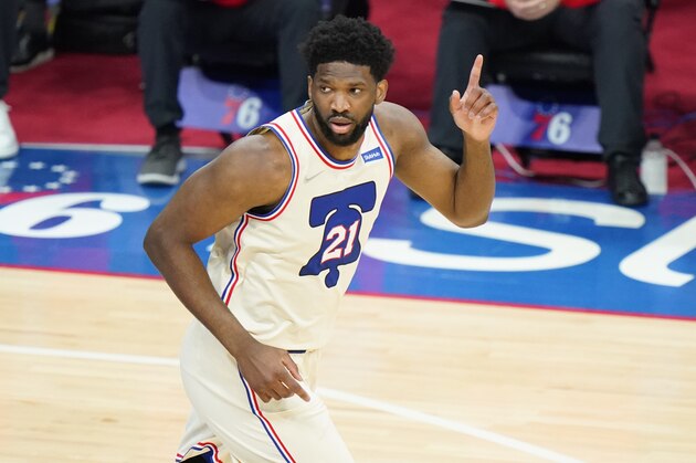 Philadelphia 76ers' Joel Embiid reacts after a basket during the first half of an NBA basketball game against the Los Angeles Clippers, Friday, April 16, 2021, in Philadelphia. (AP Photo/Matt Slocum)