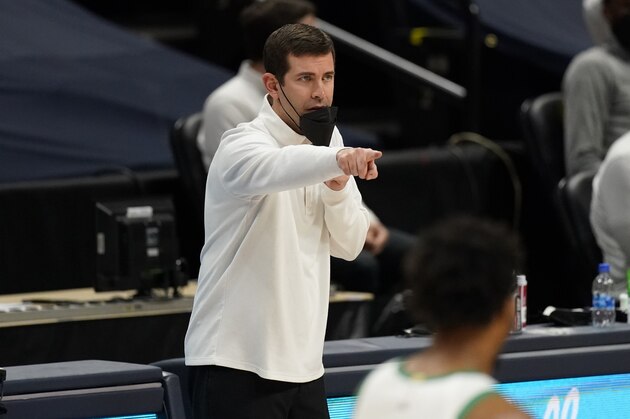Boston Celtics head coach Brad Stevens () in the second half of an NBA basketball game Sunday, April 11, 2021, in Denver. The Celtics won 105-87. (AP Photo/David Zalubowski)