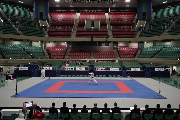 An athlete performs kata moves during a karate test event at Nippon Budokan, a venue for judo and karate at the Tokyo 2020 Olympics Monday, Sept. 9, 2019, in Tokyo. (AP Photo/Jae C. Hong)
