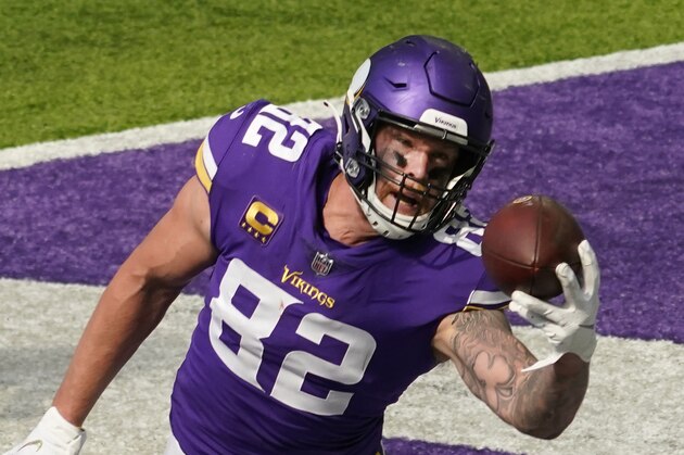 Minnesota Vikings tight end Kyle Rudolph (82) pulls in a touchdown pass against the Tennessee Titans in an NFL football game, Sunday, Sept. 27, 2020, in Minneapolis. (AP Photo/Jim Mone)