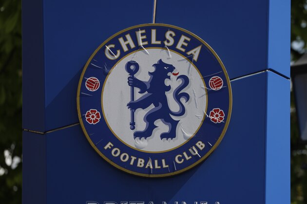 The Chelsea Football Club badge at stadium Stamford Bridge, in London, Monday, April 19, 2021, Chelsea is one of the English soccer Premier League teams who are reported to be part of a proposed European Super League. European clubs planning to start a breakaway Super League have told the leaders of FIFA and UEFA that they have begun legal action aimed at fending off threats to block the competition. (AP Photo/Alastair Grant)