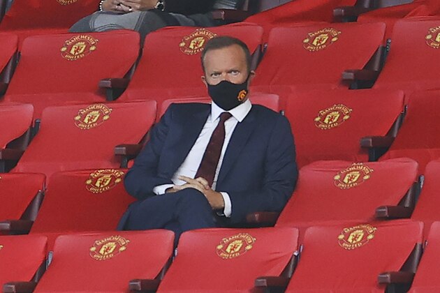 Manchester United Chief Executive Ed Woodward watches on during the English Premier League soccer match between Manchester United and Crystal Palace at the Old Trafford stadium in Manchester, England, Saturday, Sept. 19, 2020. (Richard Heathcote/Pool via AP)