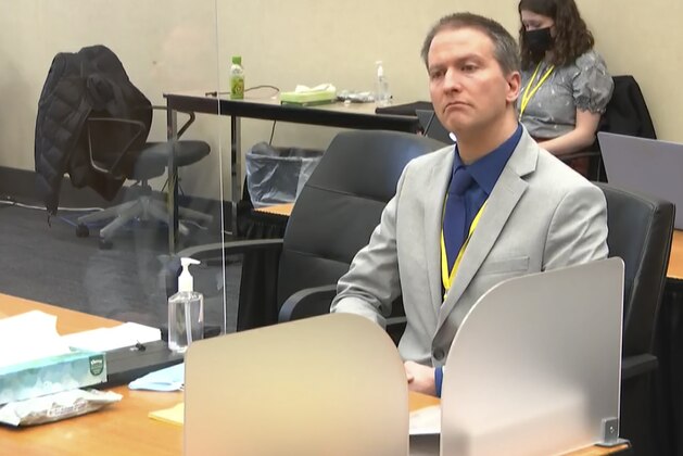 In this image from video, former Minneapolis police Officer Derek Chauvin listens as his defense attorney Eric Nelson gives closing arguments as Hennepin County Judge PeterÂ Cahill preside Monday, April 19, 2021, in the trial of Chauvin at the Hennepin County Courthouse in Minneapolis. Chauvin is charged in the May 25, 2020 death of George Floyd. (Court TV via AP, Pool)
